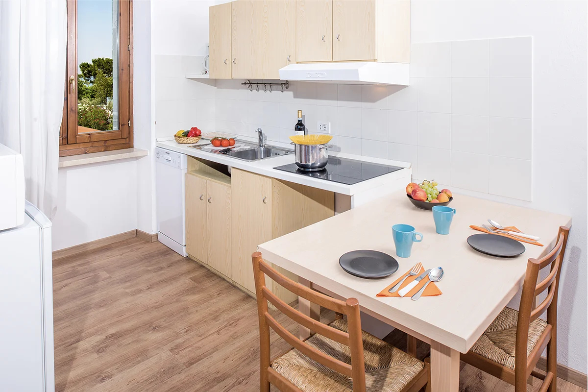 Cucina appartamento San Vigilio nel campeggio La Rocca sul Lago di Garda