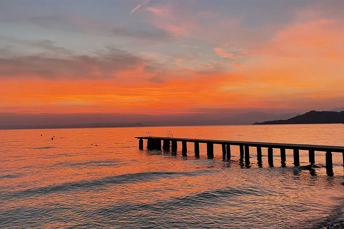Tramonto dalla spiaggia da La Rocca camping Village, Bardolino